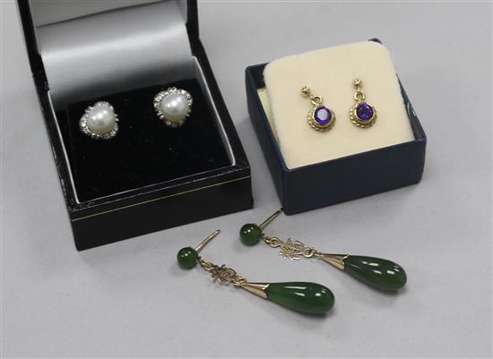 Three pairs of earrings including cultured pearl and diamond and jadeite.